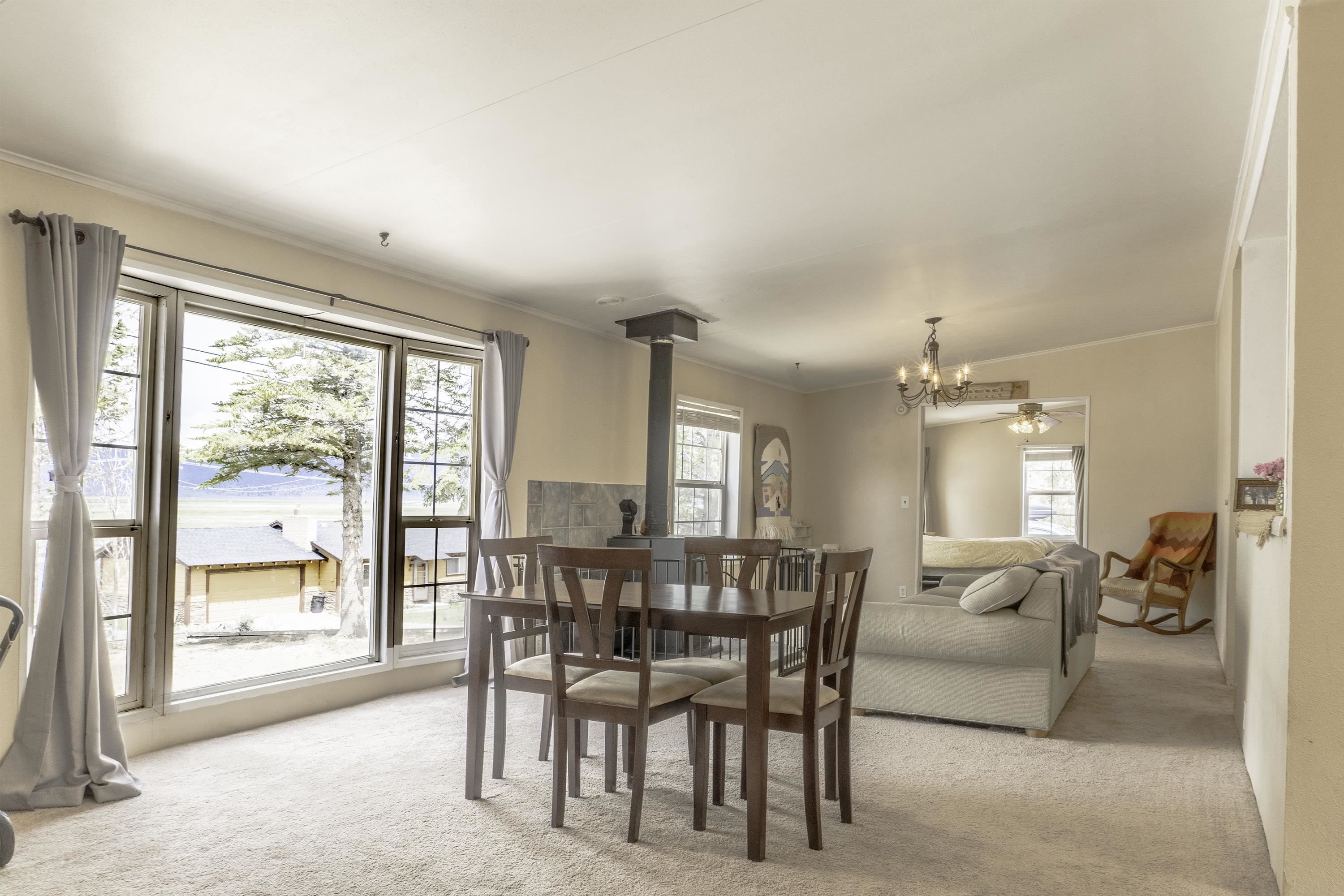 18 Eagle-Peak Bridgeport, CA 93517 - Photo 6 of 45 a view of a dining room with furniture window and outside view