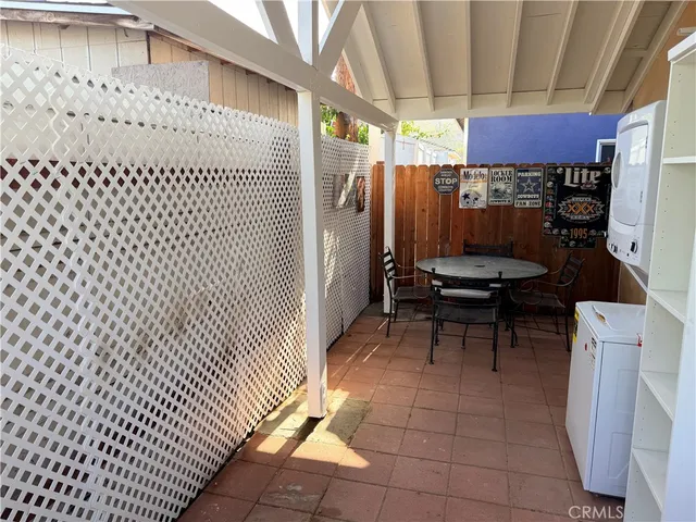 a view of a room with wooden walls