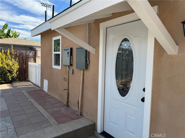 a front view of a house with a porch