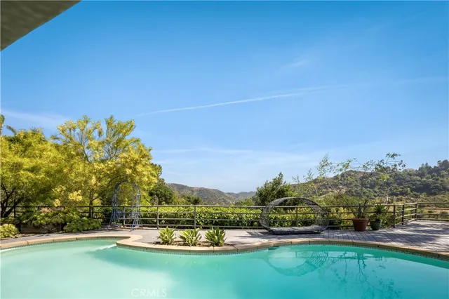 a view of a lake with a big yard