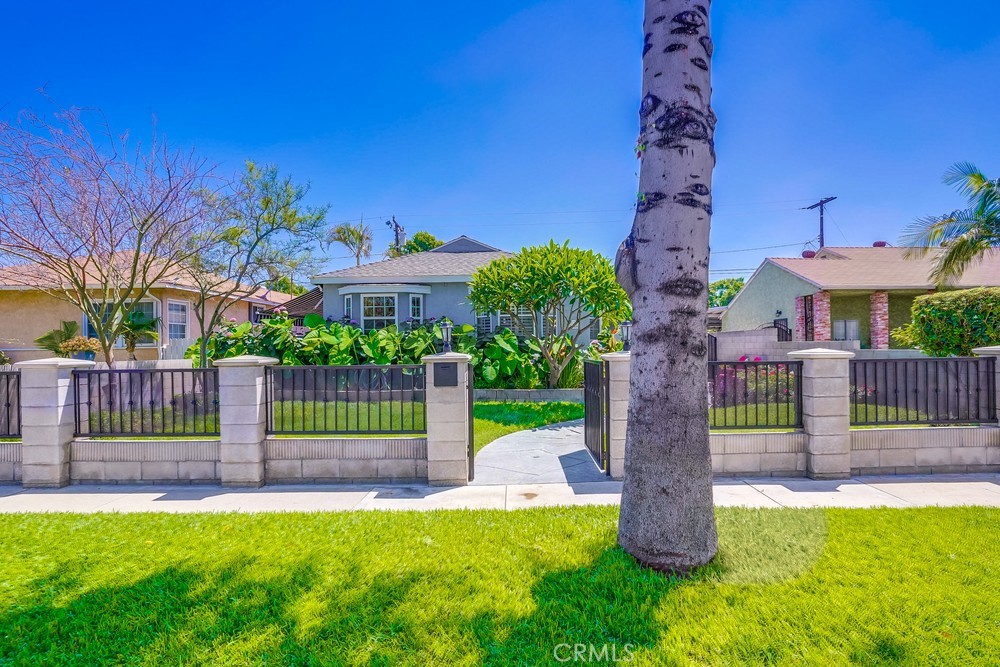 a house view with a garden space