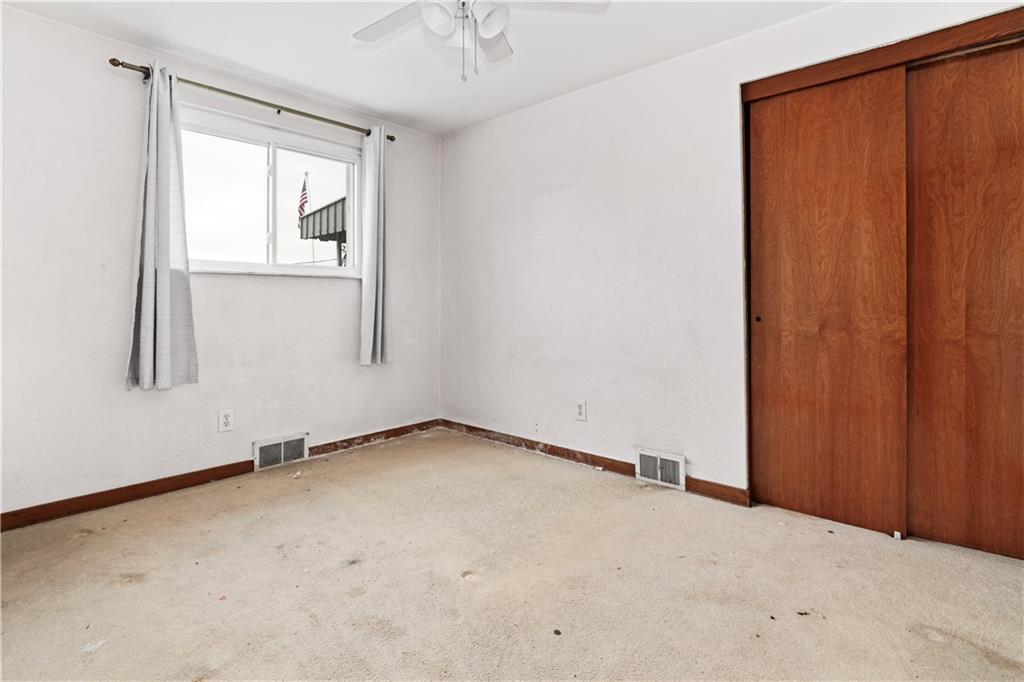 217 Mifflin Street Homestead, PA 15120 - Photo 13 of 26 an empty room with windows