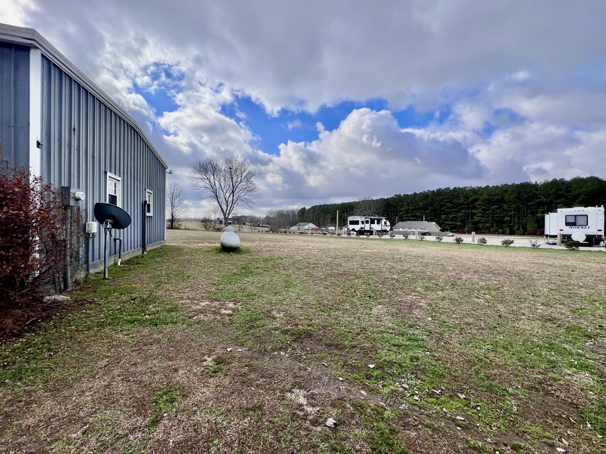 9 Ford Road Leoma, TN 38468 - Photo 2 of 19 a backyard of a house with table and chairs