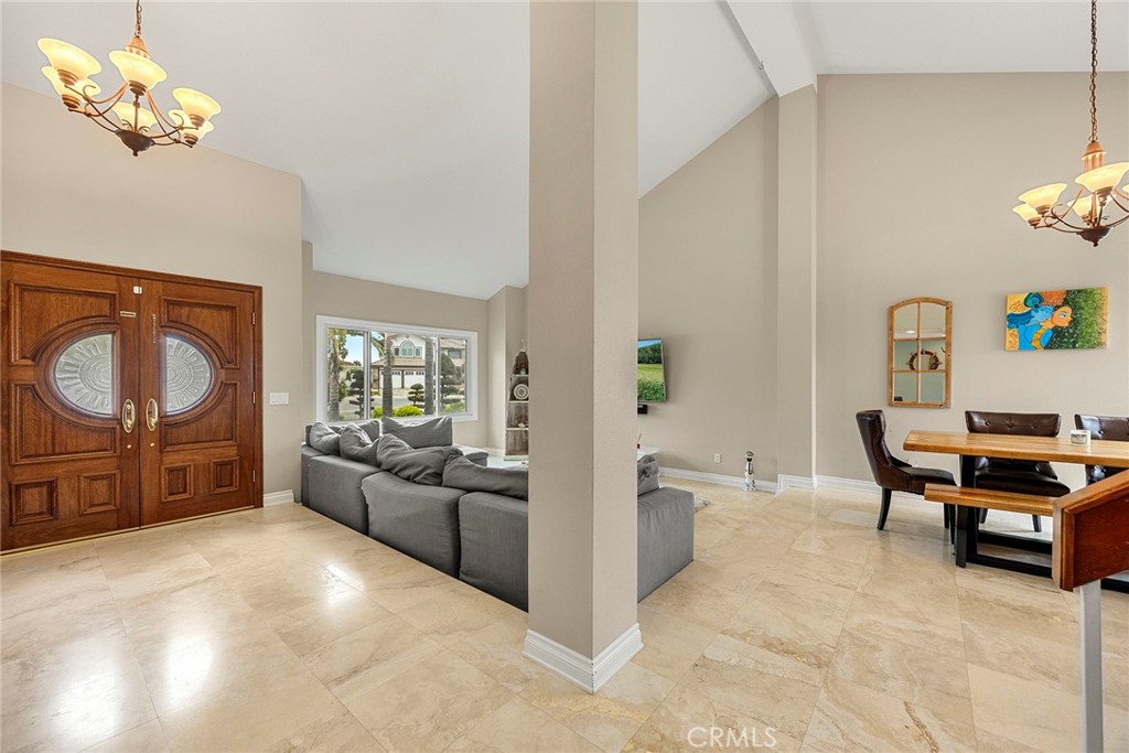 6 Sand Pointe Laguna Niguel, CA 92677 - Photo 11 of 49 a living room with furniture a fireplace and a flat screen tv