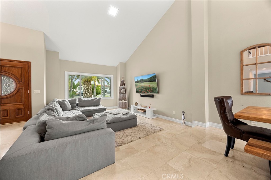 6 Sand Pointe Laguna Niguel, CA 92677 - Photo 12 of 49 a living room with furniture and a flat screen tv