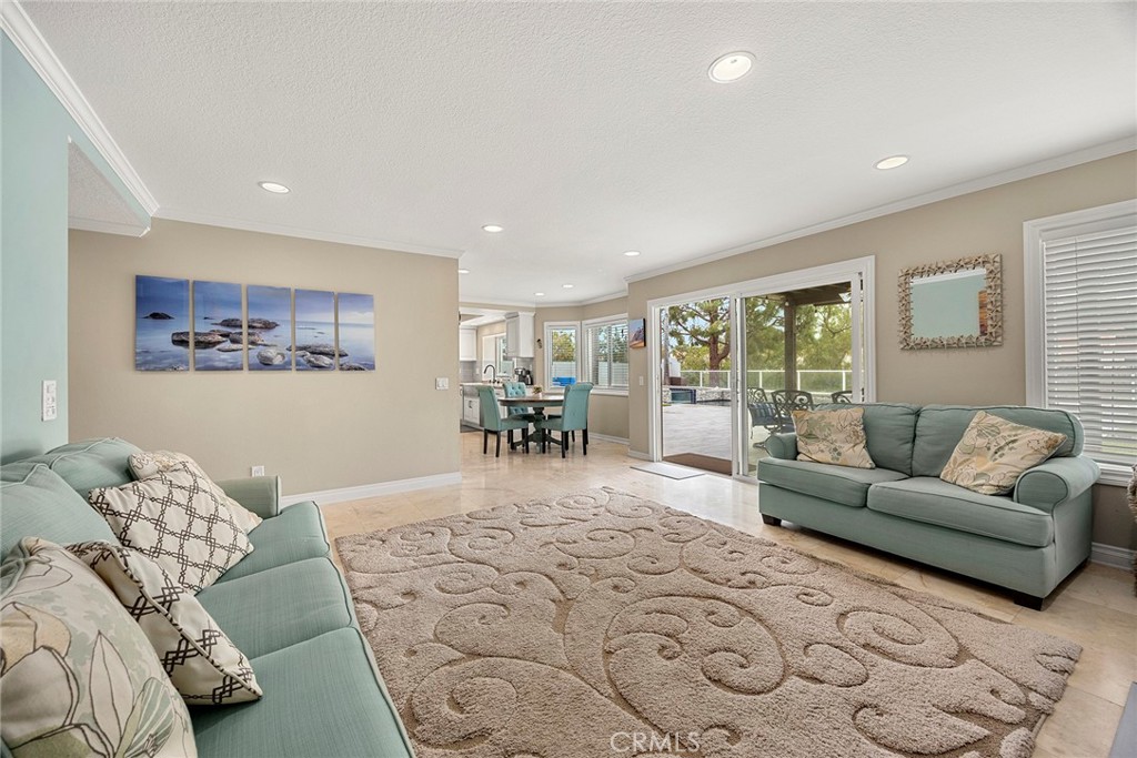 6 Sand Pointe Laguna Niguel, CA 92677 - Photo 24 of 49 a living room with furniture and a table