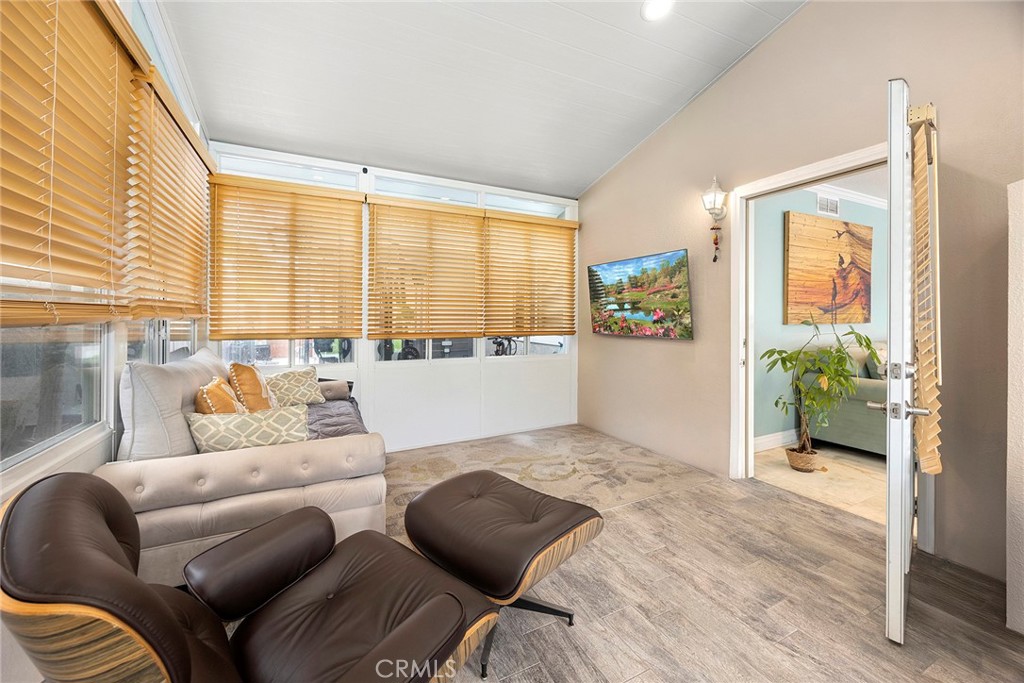6 Sand Pointe Laguna Niguel, CA 92677 - Photo 26 of 49 a living room with furniture and a large window