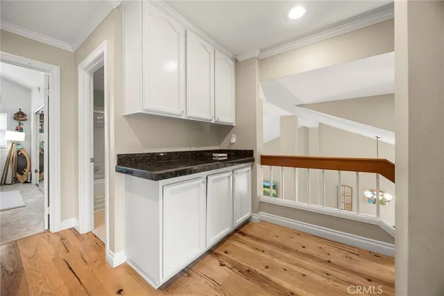 a bedroom with furniture and a bed