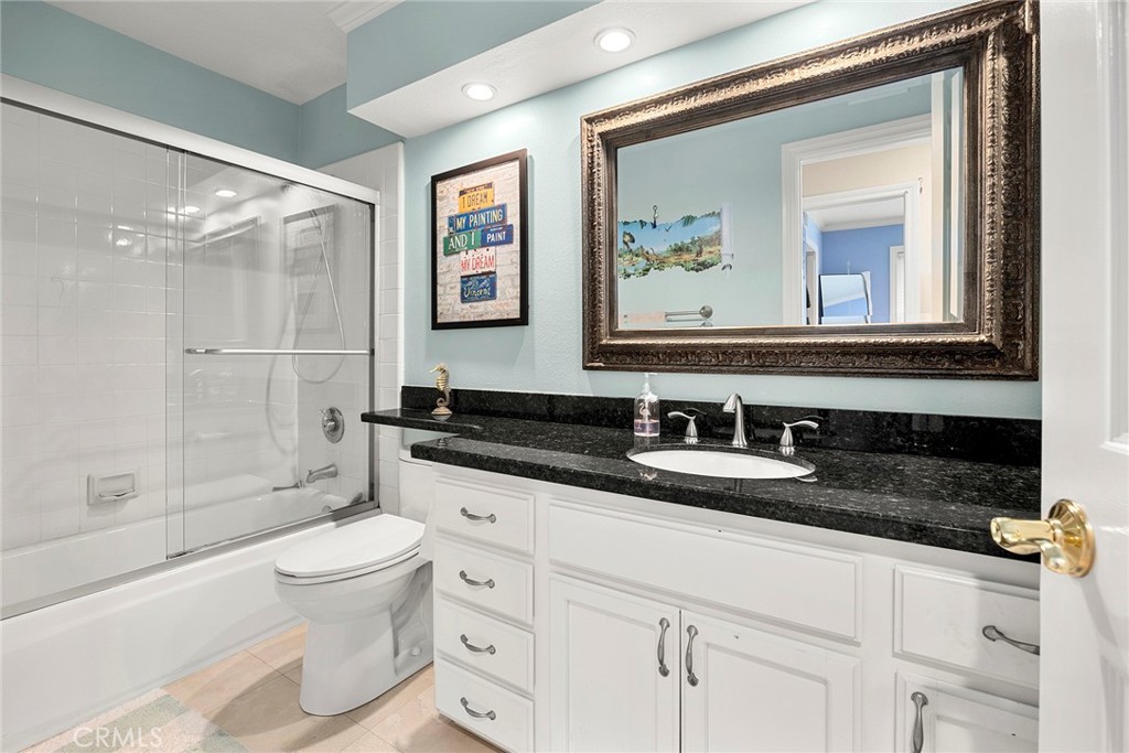 6 Sand Pointe Laguna Niguel, CA 92677 - Photo 32 of 49 a bathroom with a granite countertop sink mirror toilet and bathtub
