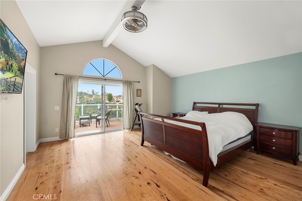 6 Sand Pointe Laguna Niguel, CA 92677 - Photo 33 of 49 a bed room with a bed and a large window