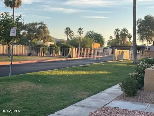 a house view with swimming pool
