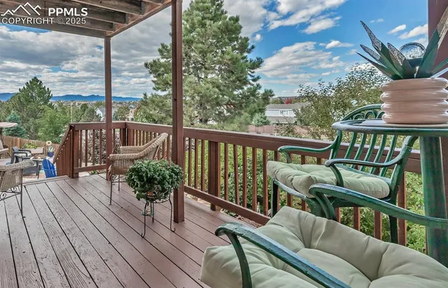 a view of balcony with furniture