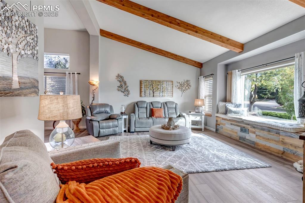 7120 Highcroft Drive Colorado Springs, CO 80922 - Photo 6 of 50 a living room with furniture and a large window