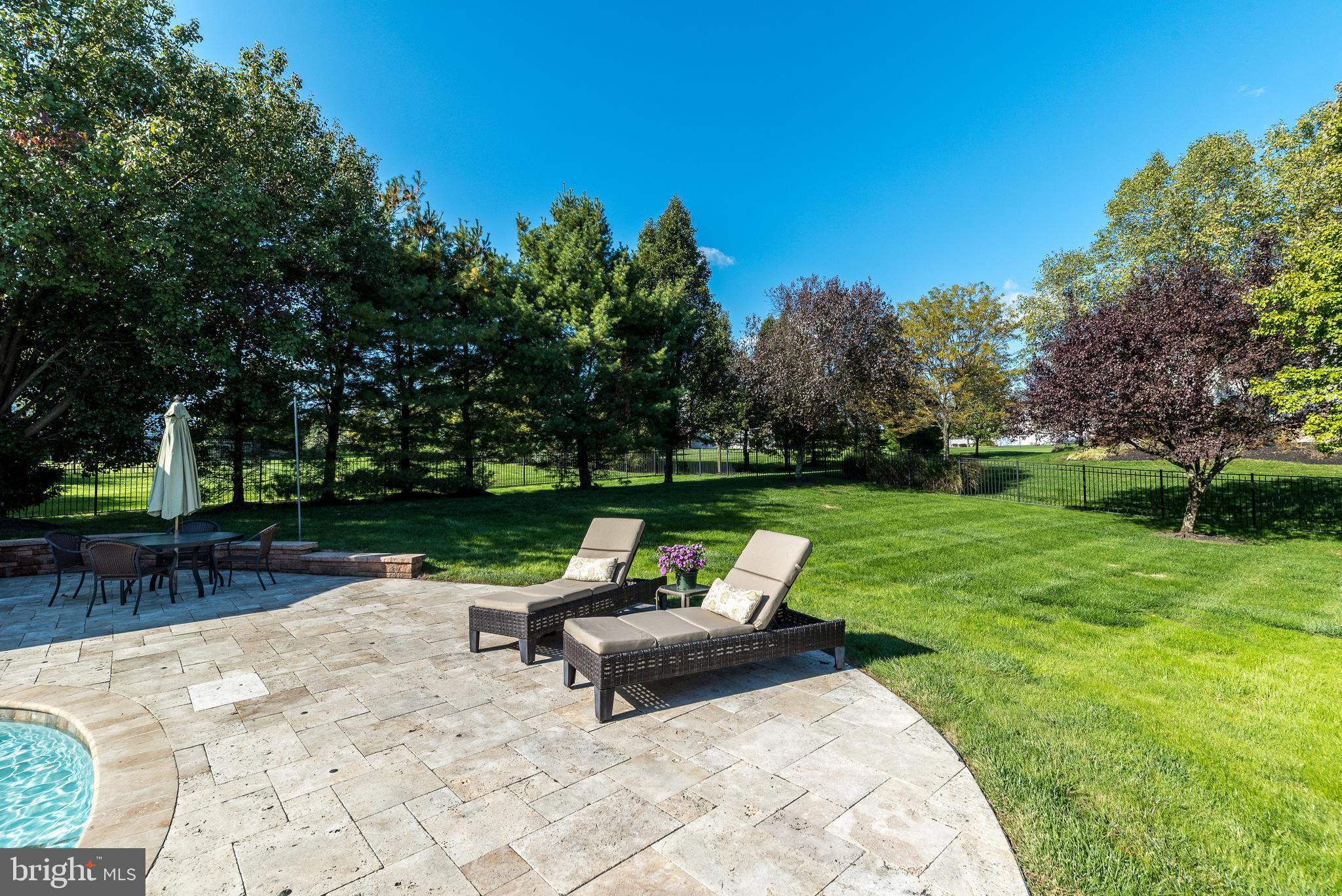 2522 Lockleigh Road Jamison, PA 18929 - Photo 42 of 58 Travertine decking and side yard