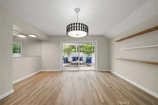 a view of front door with wooden floor