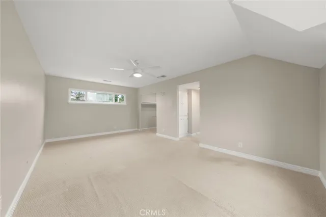 an empty room with a empty space and window