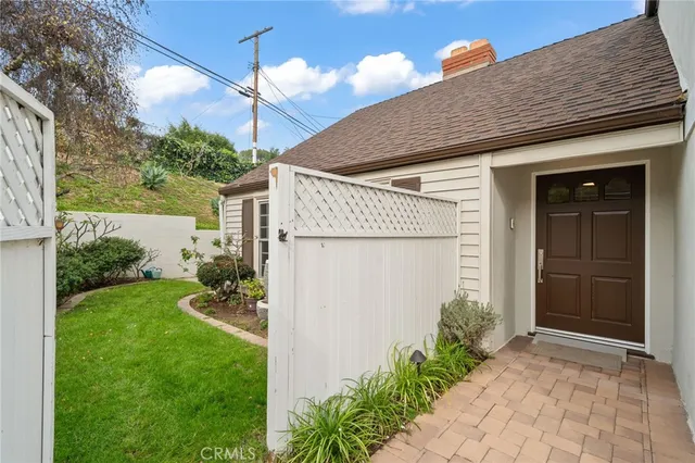 a house view with a garden space