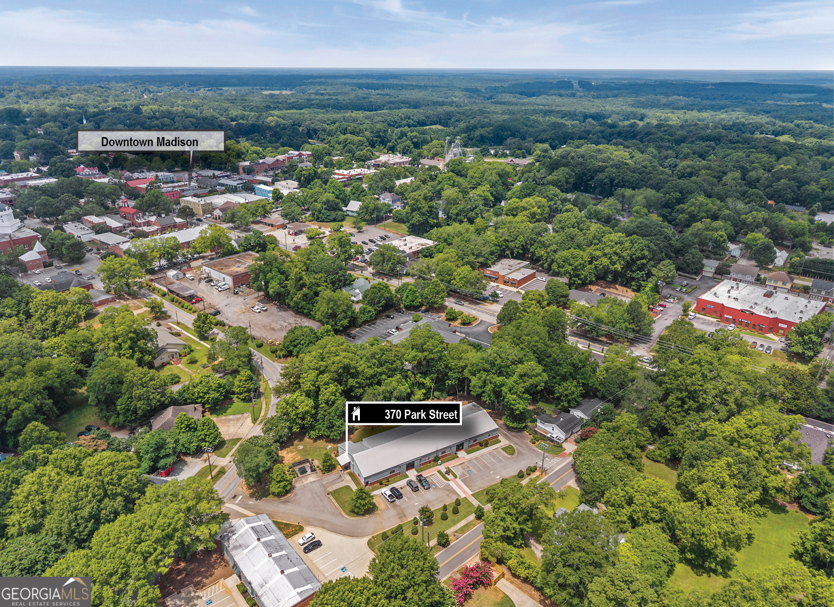 370 Park Street, Unit 8 Madison, GA 30650 - Photo 2 of 22 an aerial view of multiple house