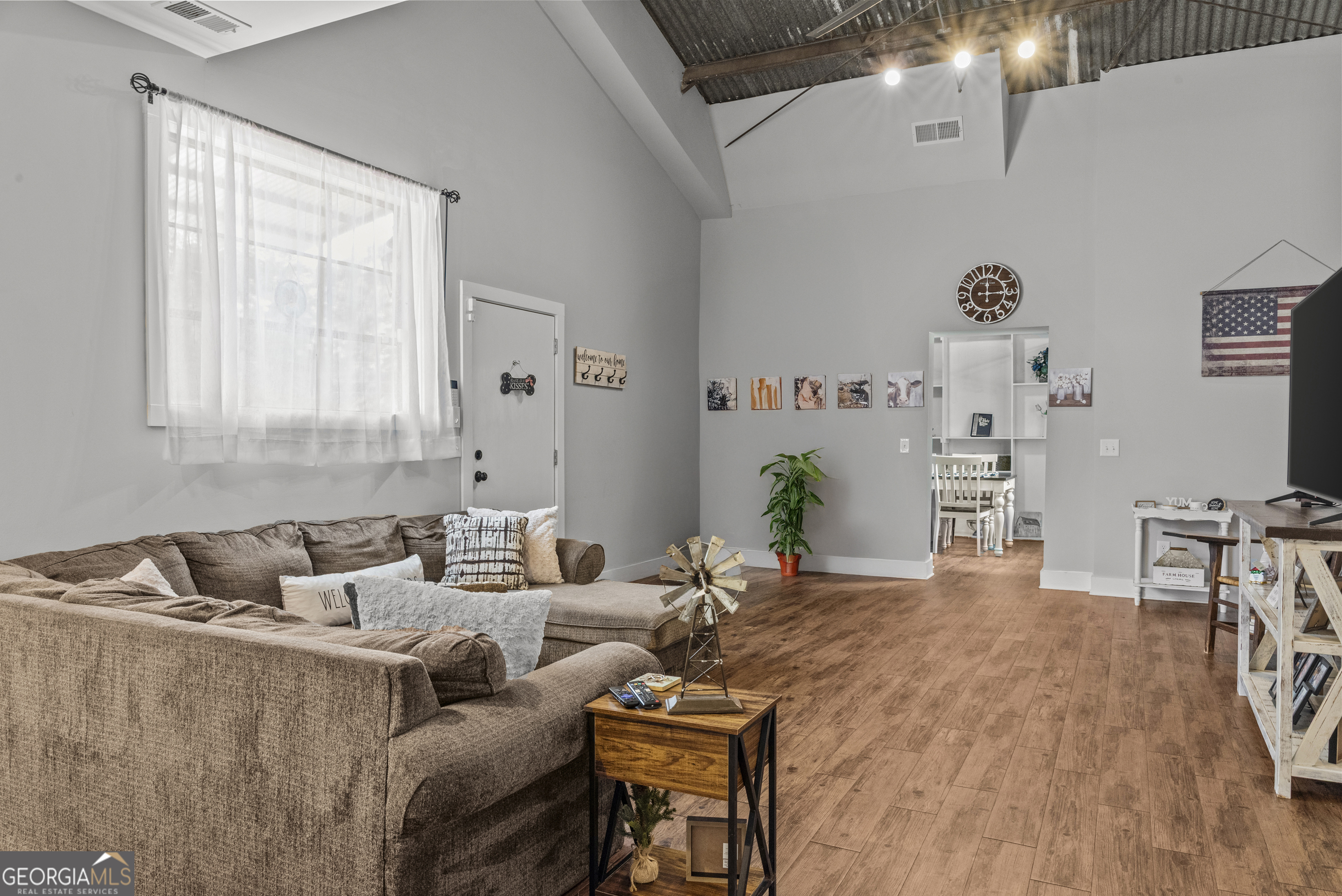 370 Park Street, Unit 8 Madison, GA 30650 - Photo 6 of 22 a living room with furniture and wooden floor