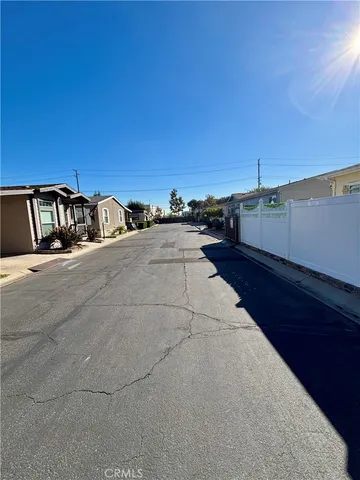 a view of parking garage with cars parked