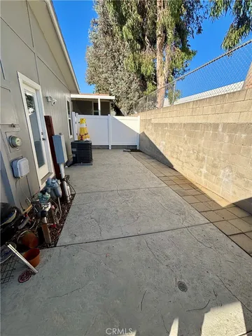 a view of a terrace with wooden walls and floor