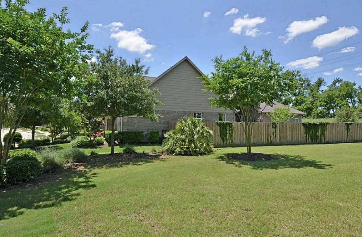 1447 Ralston Branch Way Sugar Land, TX 77479 - Photo 19 of 21 Vast green space on the other side of the fence. With no side or back neighbors, you’ll always have peace and privacy.