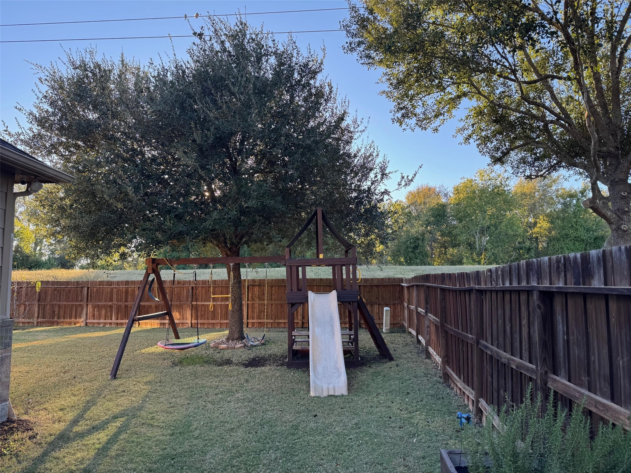 1447 Ralston Branch Way Sugar Land, TX 77479 - Photo 21 of 21 This play area in the fenced backyard beckons long hours of outdoor enjoyment.