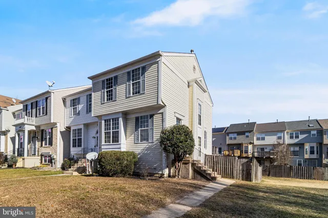 a front view of a building with street view