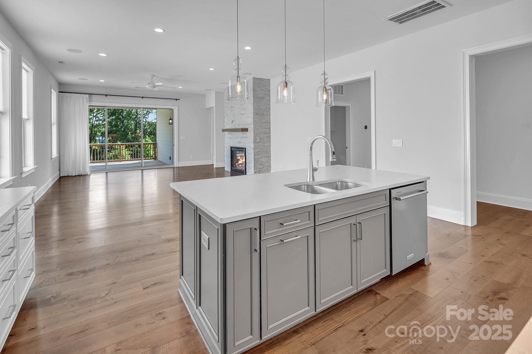14008 Little Spring Court Charlotte, NC 28278 - Photo 11 of 44 a bathroom with a double vanity sink and a mirror