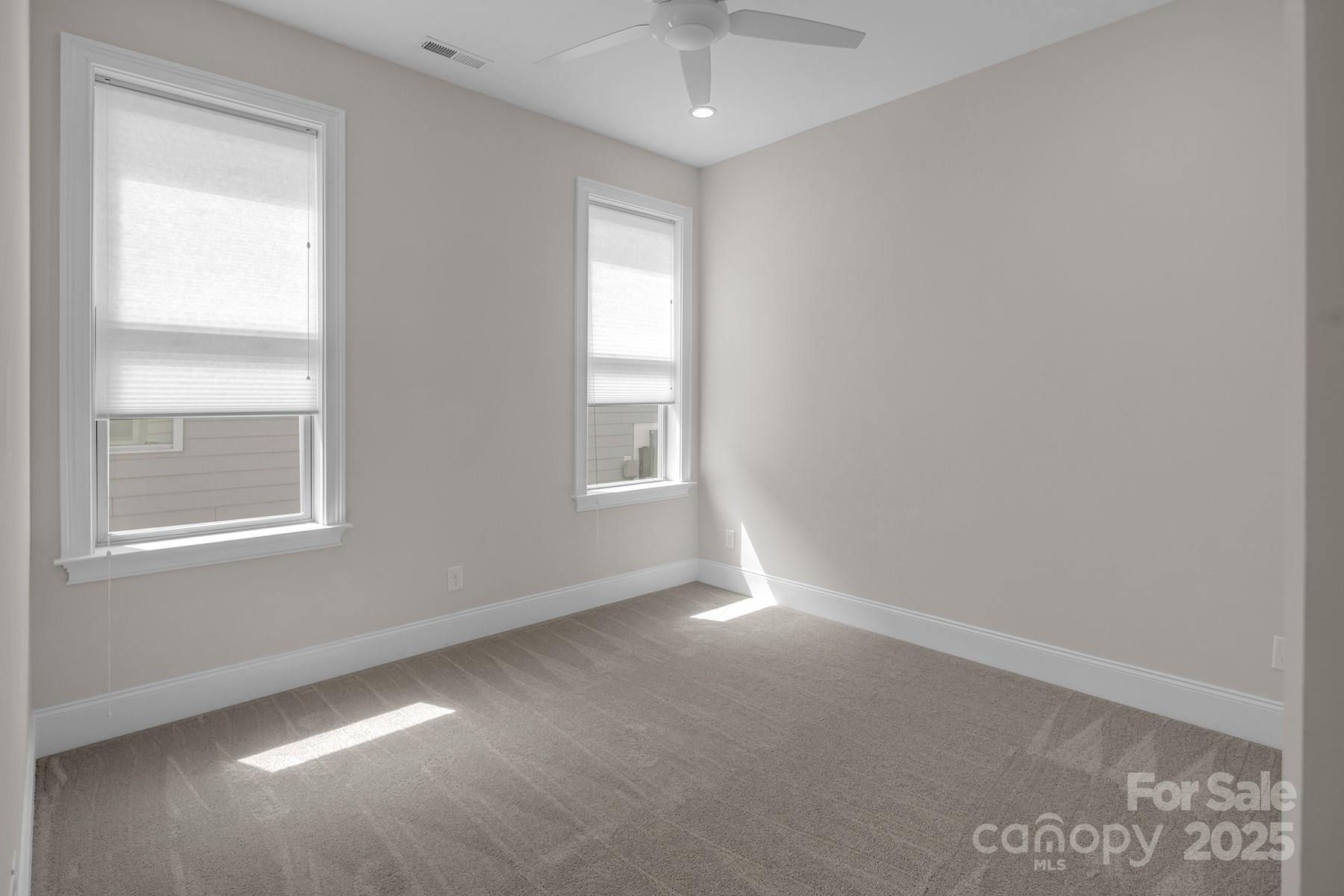14008 Little Spring Court Charlotte, NC 28278 - Photo 30 of 44 an empty room with a window