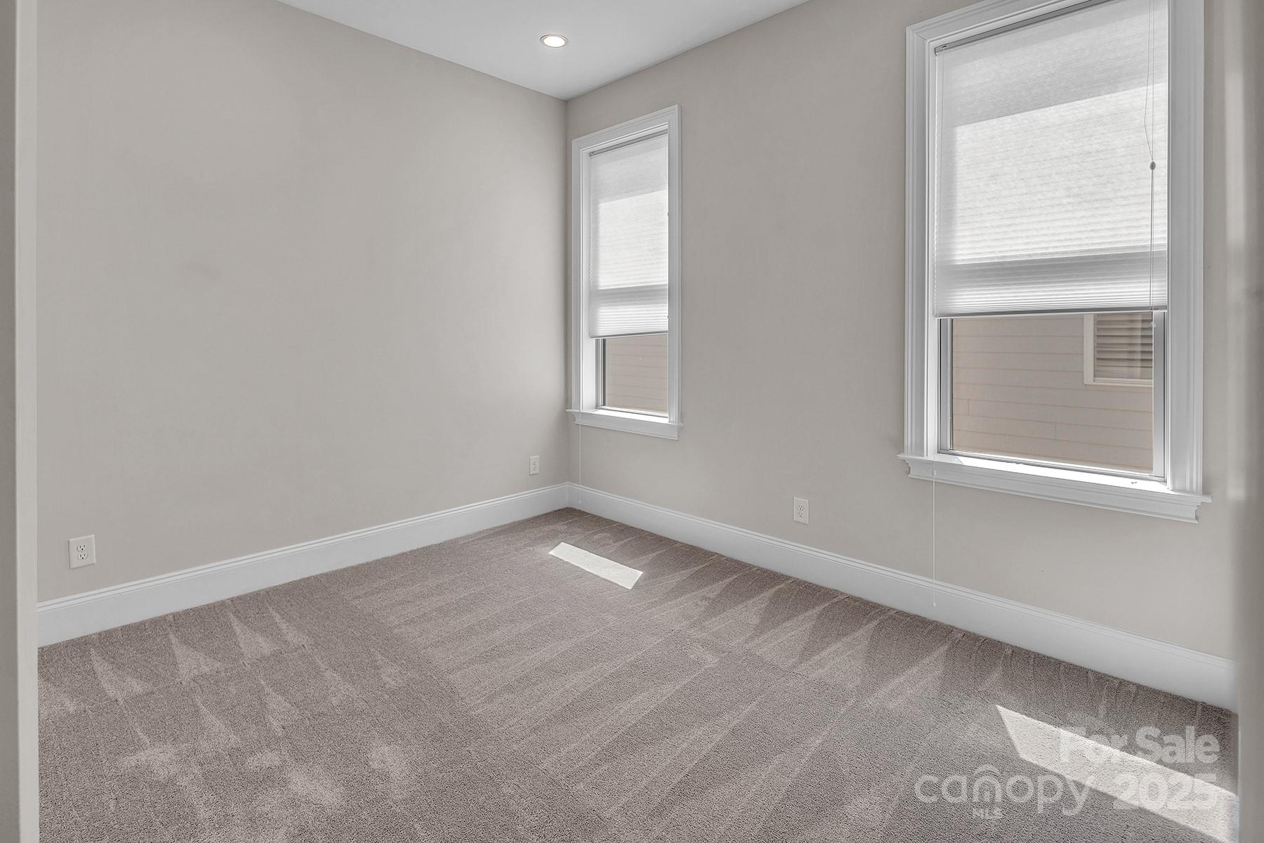 14008 Little Spring Court Charlotte, NC 28278 - Photo 33 of 44 a view of an empty room with a window