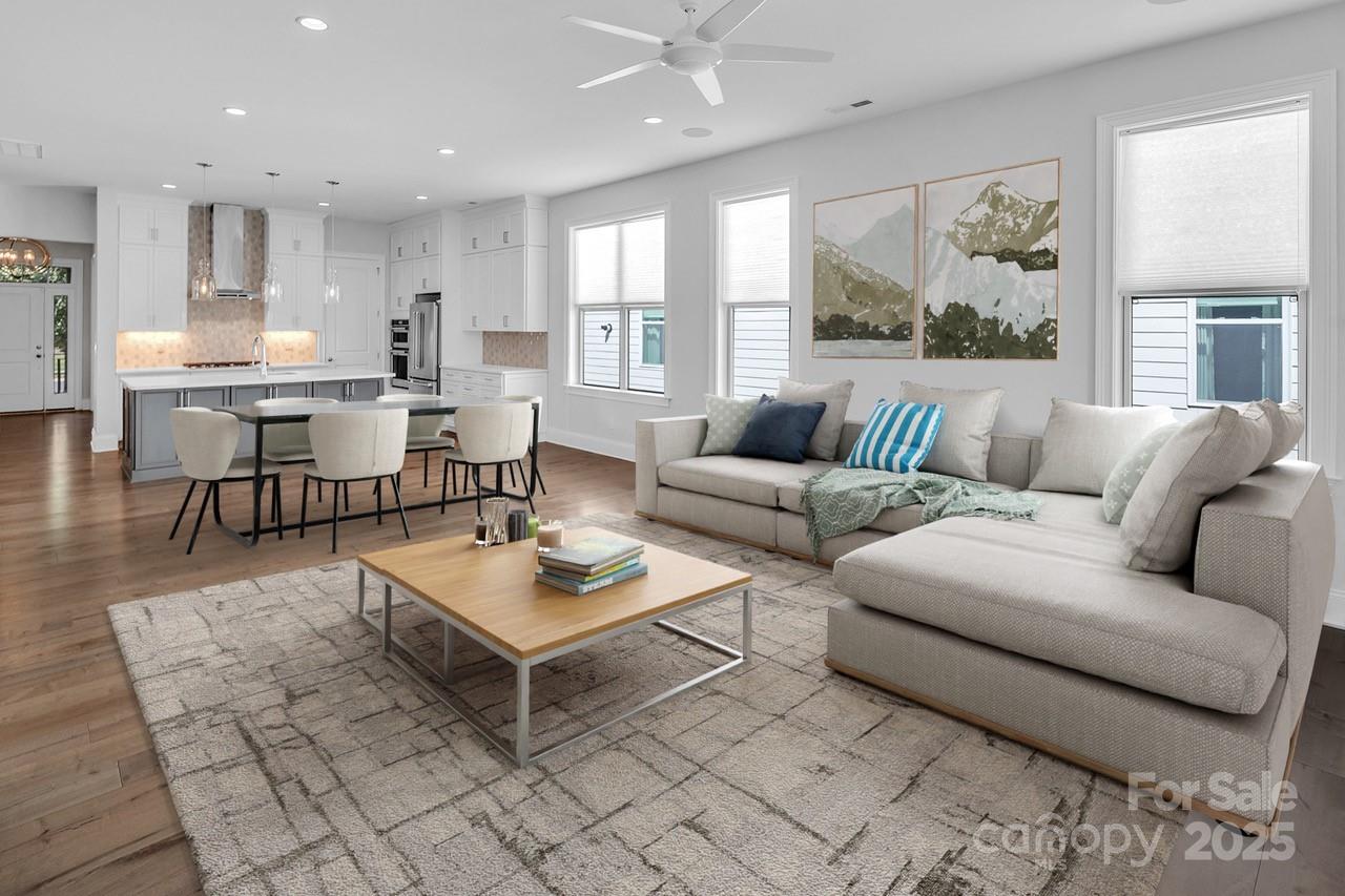 14008 Little Spring Court Charlotte, NC 28278 - Photo 4 of 44 a living room with furniture and a large window