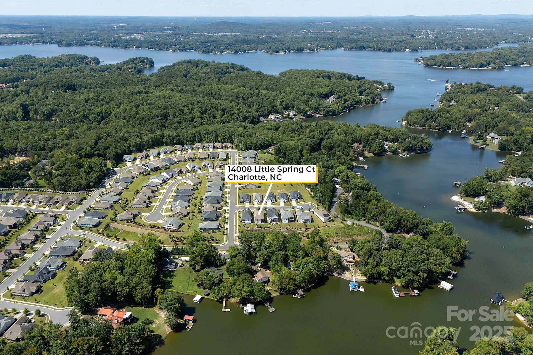 14008 Little Spring Court Charlotte, NC 28278 - Photo 41 of 44 an aerial view of lake and residential houses with outdoor space