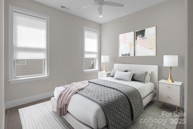 14008 Little Spring Court Charlotte, NC 28278 - Photo 8 of 44 a bedroom with a bed and a window