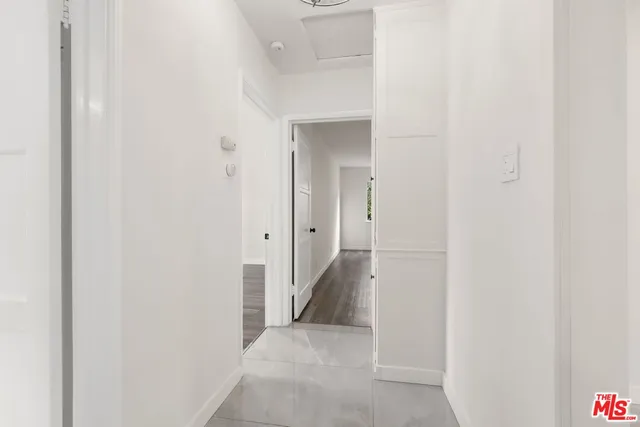 a view of hallway with closet