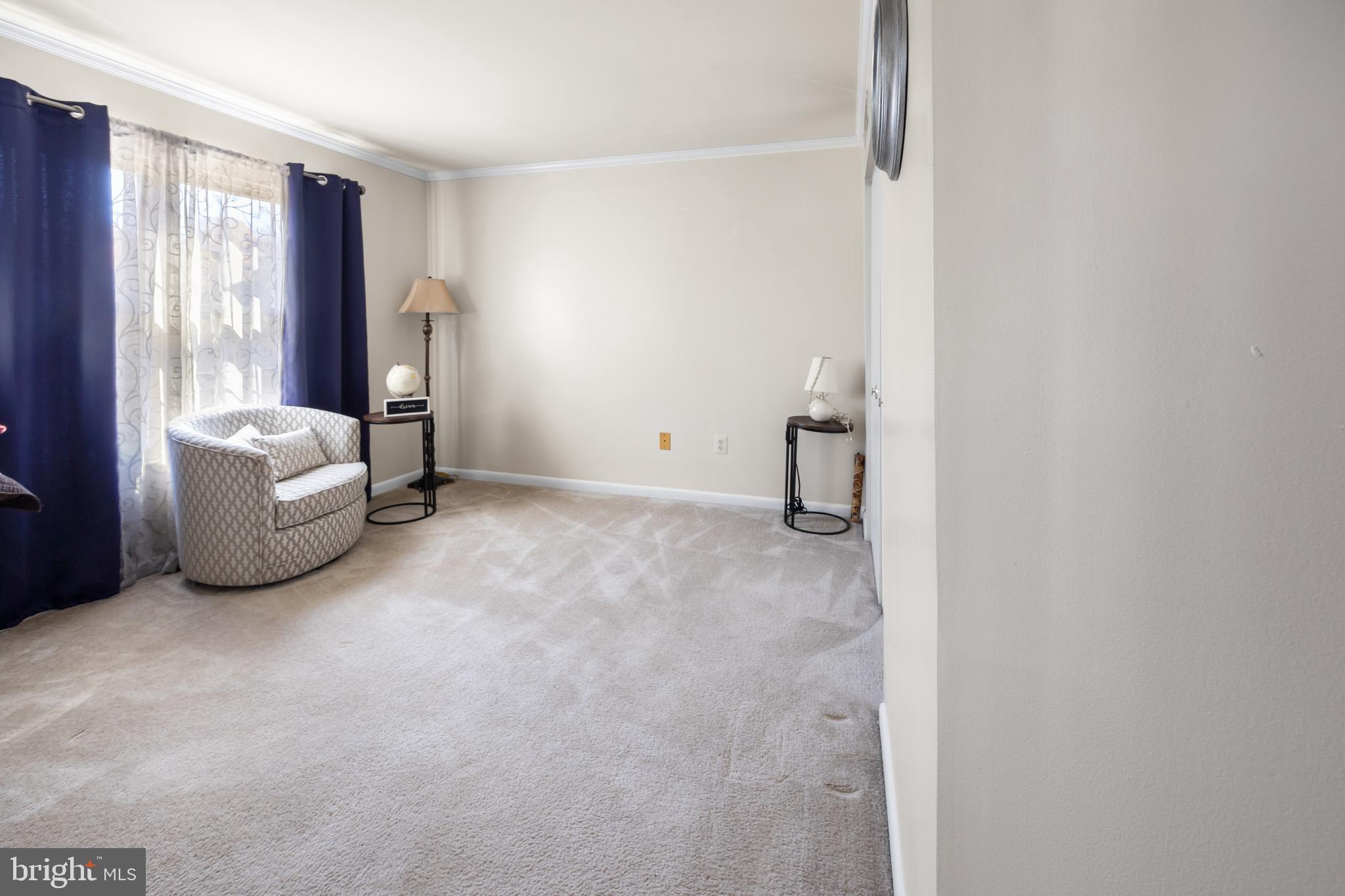 10 Sandstone Court Annapolis, MD 21403 - Photo 14 of 17 a room with a bed and a couch