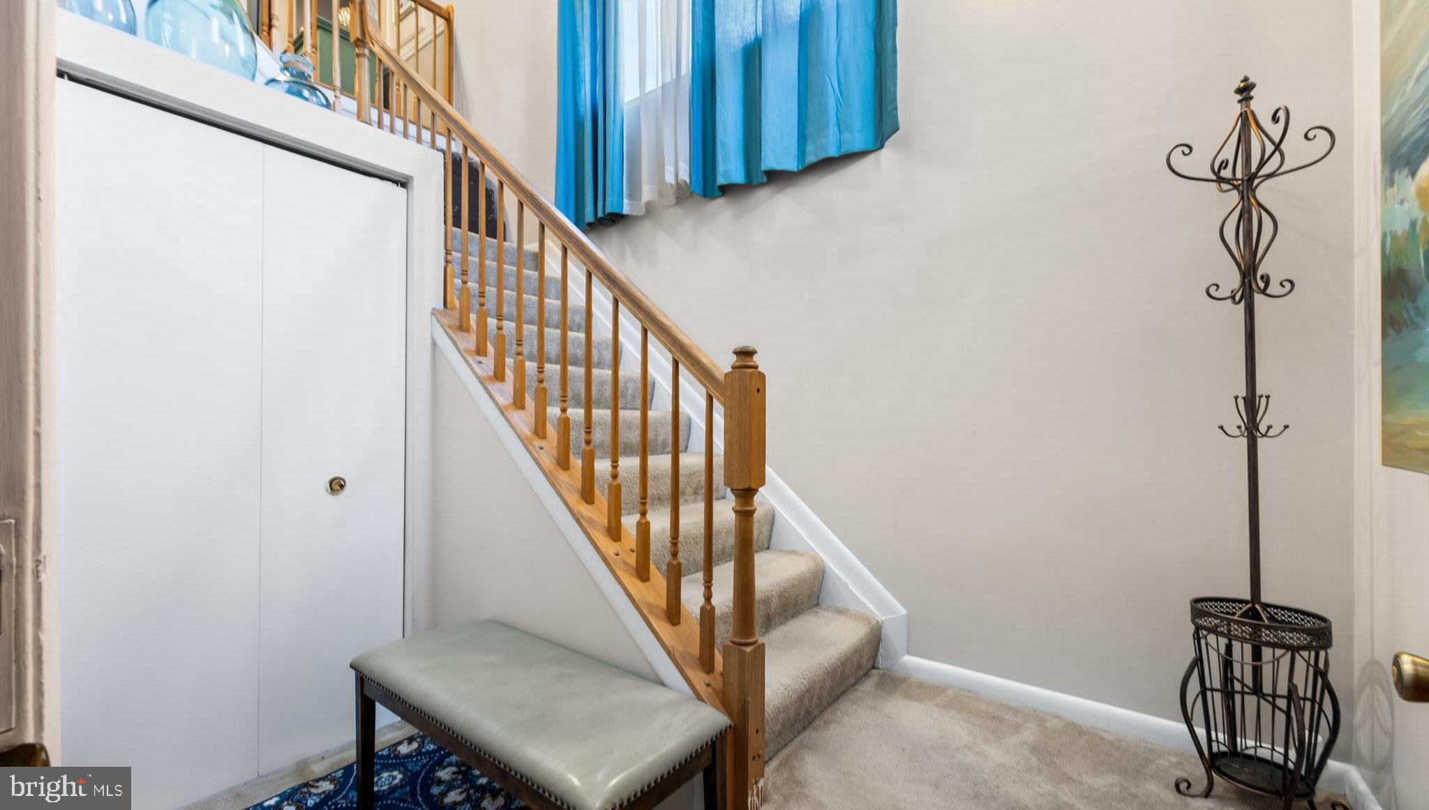 10 Sandstone Court Annapolis, MD 21403 - Photo 2 of 17 a view of staircase with wooden floor