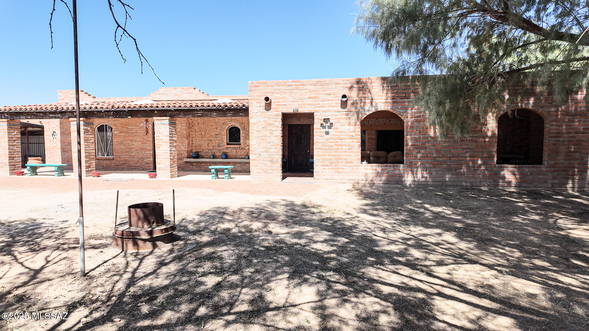 1094 North Pomerene Road Benson, AZ 85602 - Photo 1 of 48 a view of a house with a yard