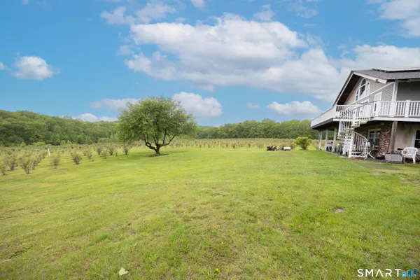 a view of a lake with a big yard