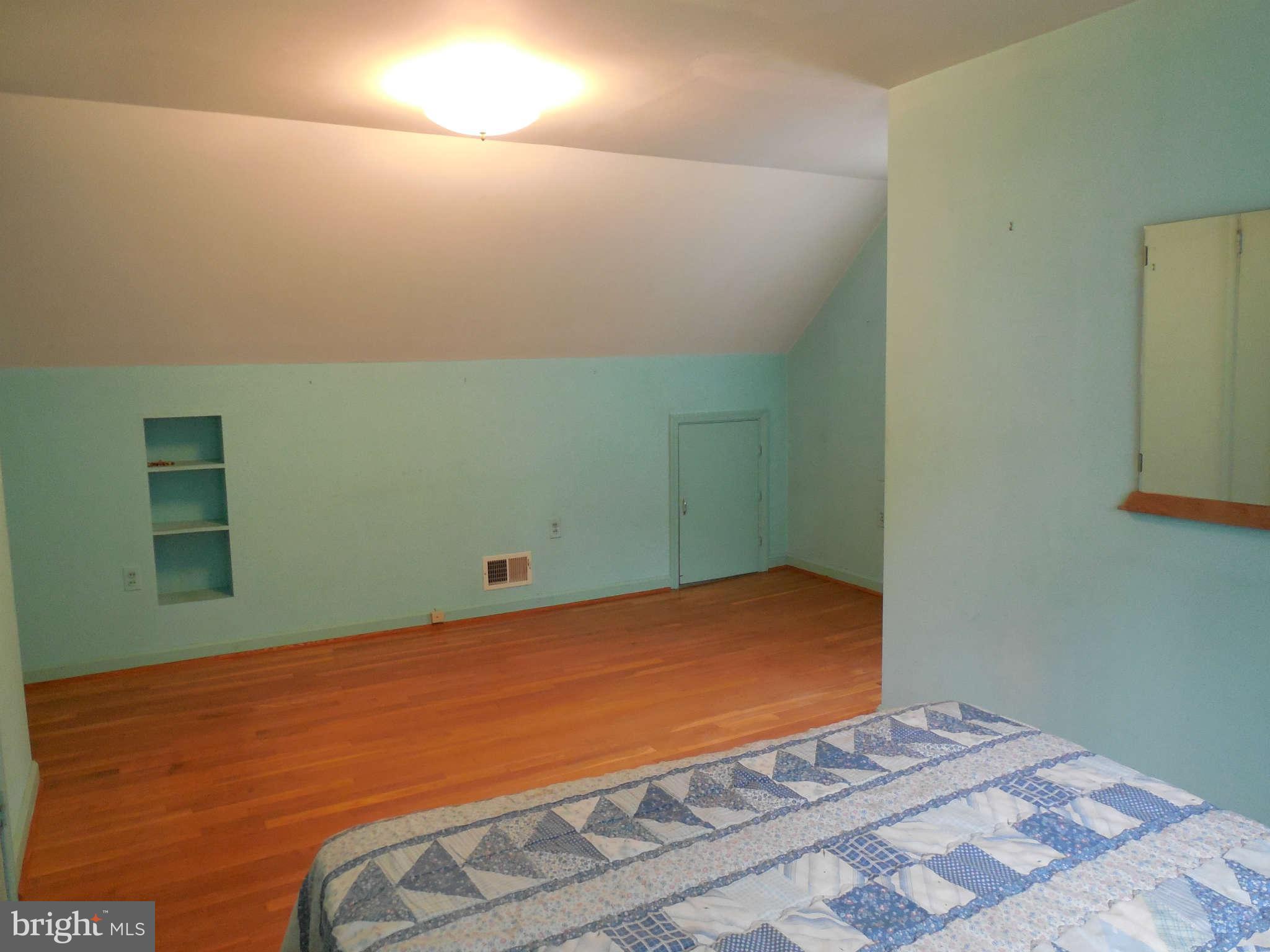 12703 Holdridge Road Silver Spring, MD 20906 - Photo 14 of 25 a bedroom with a bed