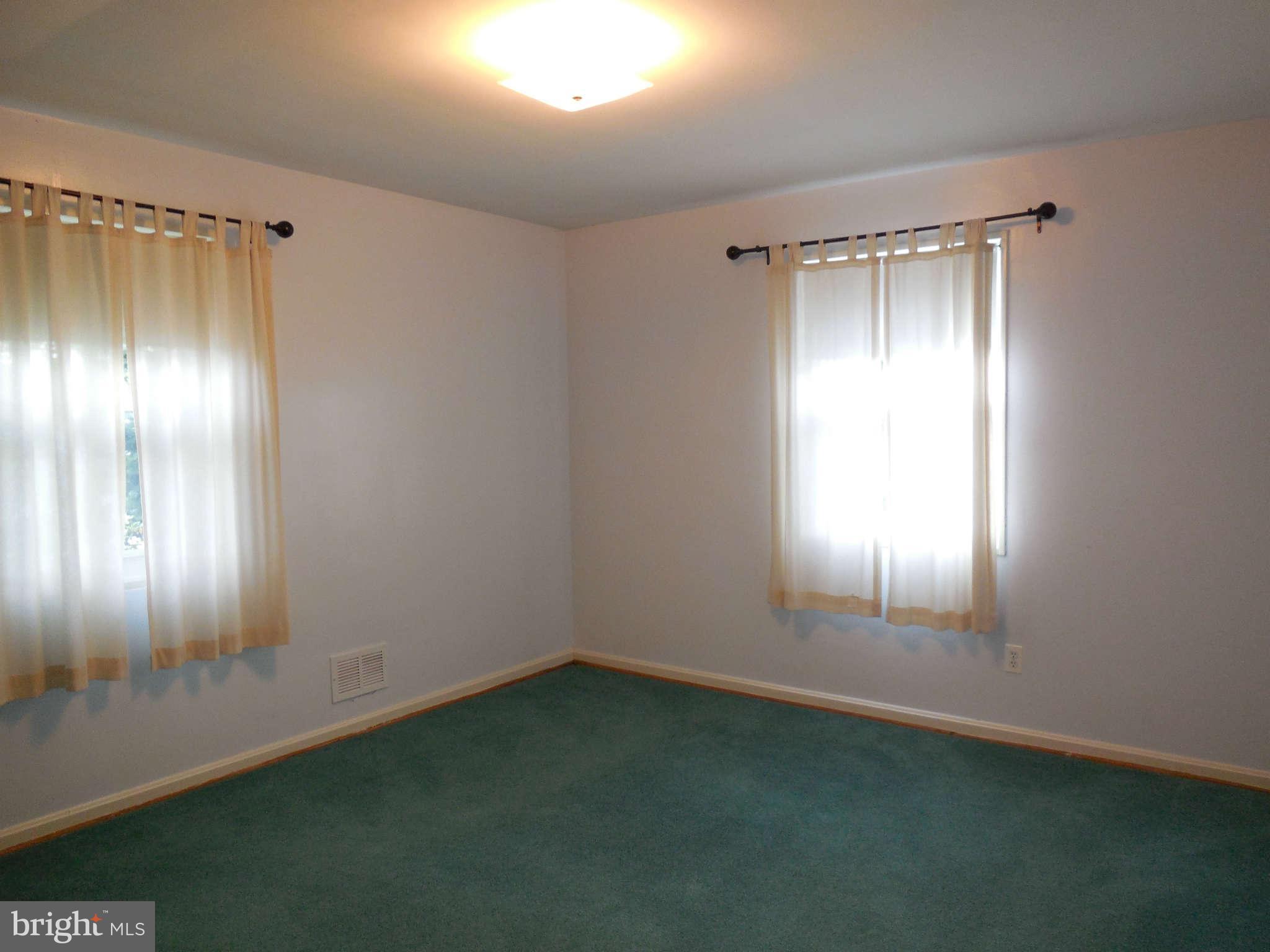 12703 Holdridge Road Silver Spring, MD 20906 - Photo 8 of 25 a view of an empty room and window in an empty room