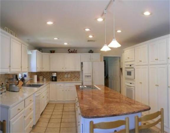 62 Claybrook Road Sunderland, MA 01375 - Photo 3 of 15 a kitchen with stainless steel appliances granite countertop a sink refrigerator and cabinets
