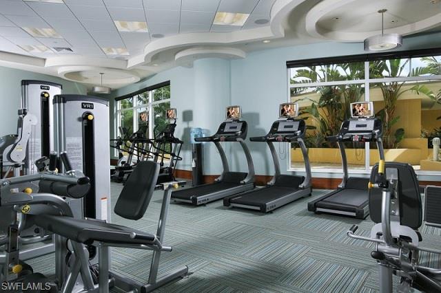 13665 Vanderbilt Drive, Unit 701 Naples, FL 34110 - Photo 15 of 22 a view of a room with gym equipment