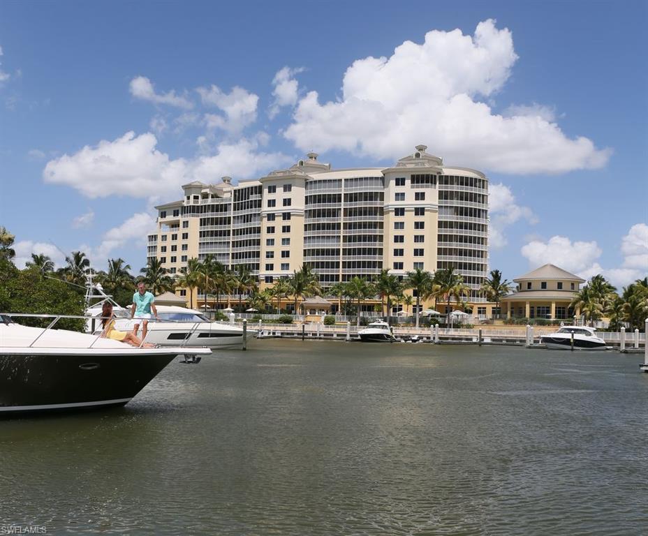13665 Vanderbilt Drive, Unit 701 Naples, FL 34110 - Photo 21 of 22 a view of a city that has tall buildings