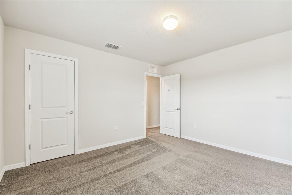 6793 Southwest 90th Loop Ocala, FL 34476 - Photo 7 of 23 a view of an empty room