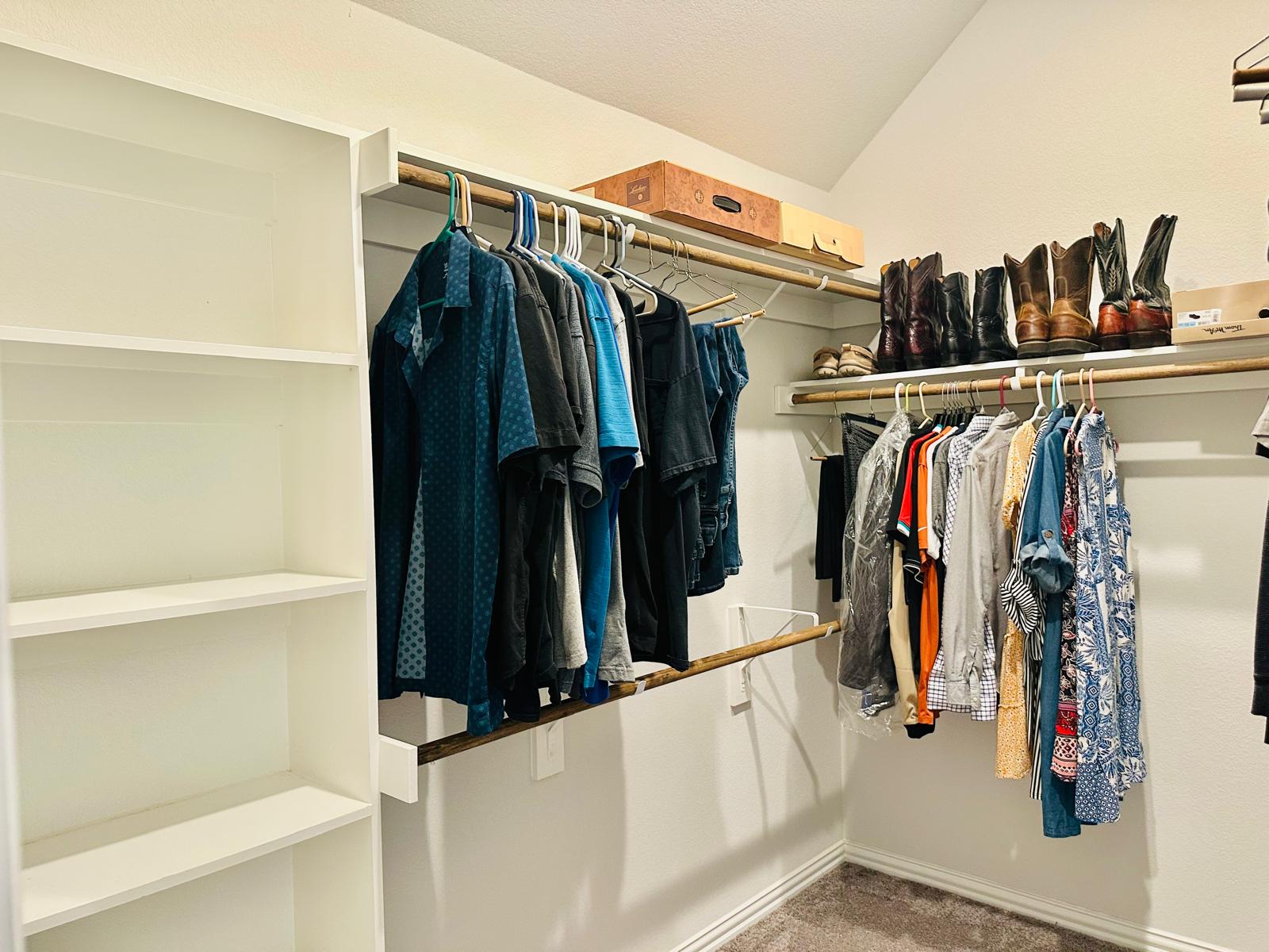 862 Leadtree Loop Buda, TX 78610 - Photo 33 of 40 a view of walk in closet with clothes and shoes