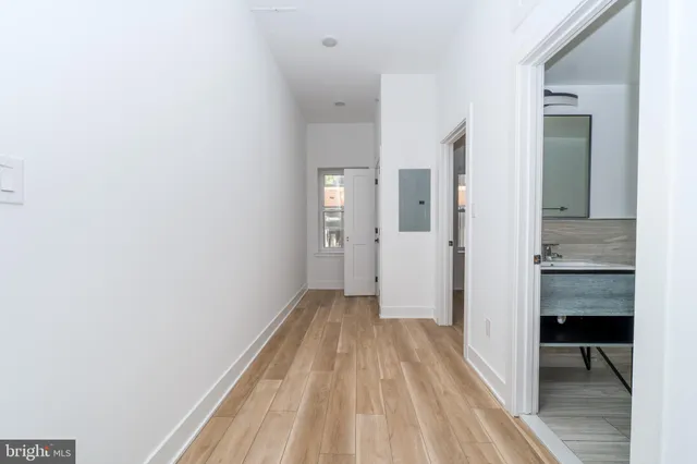 a bathroom with a toilet and a bathtub