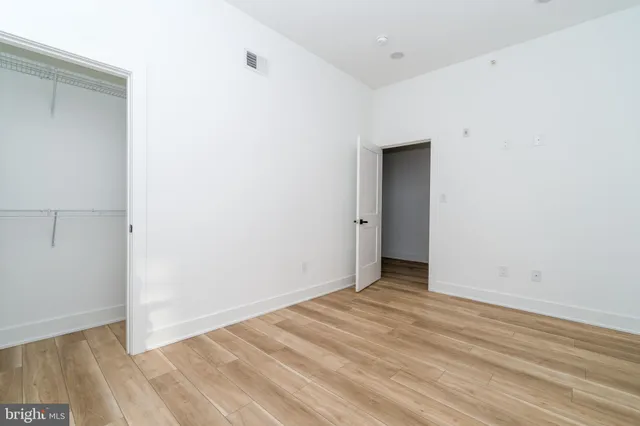 a view of empty room with windows