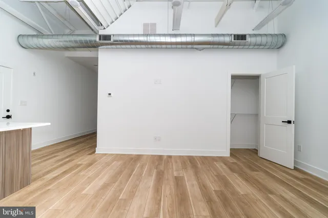 a view of a kitchen with a sink