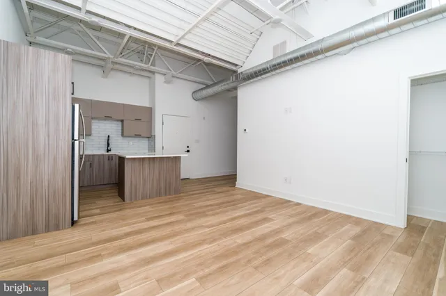 a view of a kitchen cabinets a sink and dishwasher